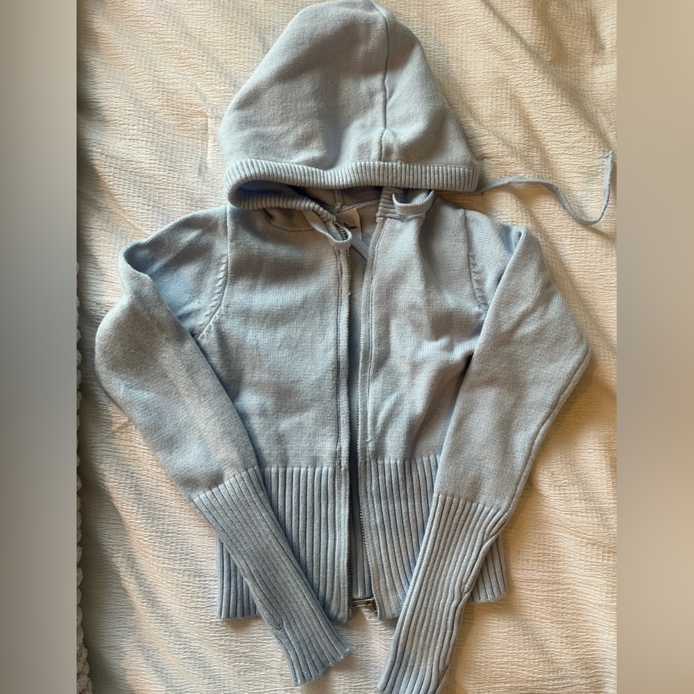 Isabelle’s cabinet knit baby blue zip up